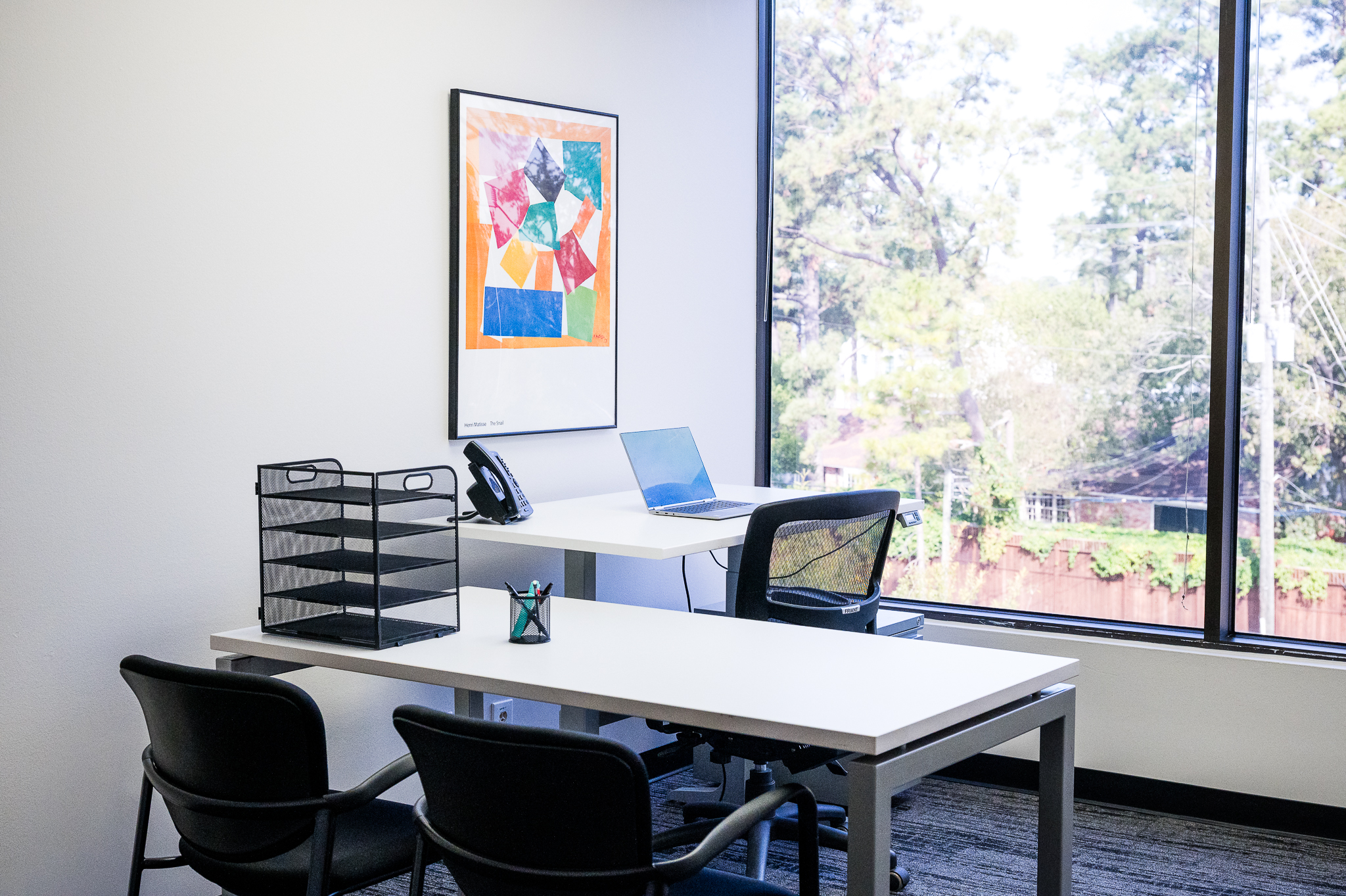 Furnished private office space with natural light